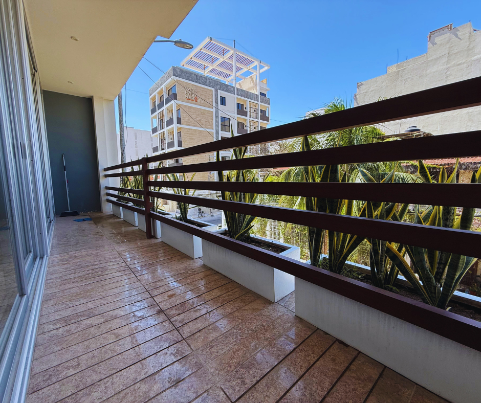 Private balcony with city views in a fully furnished long-term rental apartment in Playa del Carmen.