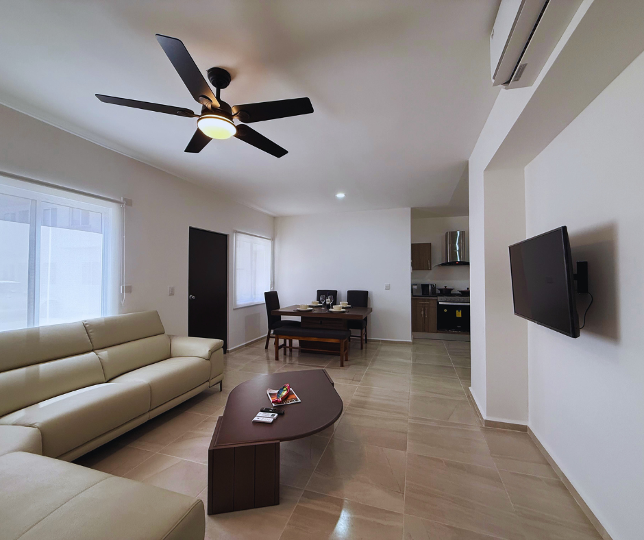 Furnished living room with air conditioning and TV